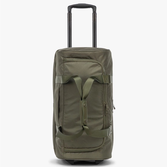 Calpak Bags Gently Used Stevyn Rolling Duffel By Calpak Poshmark
